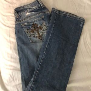 Guess distressed boot cut jeans, studded pockets